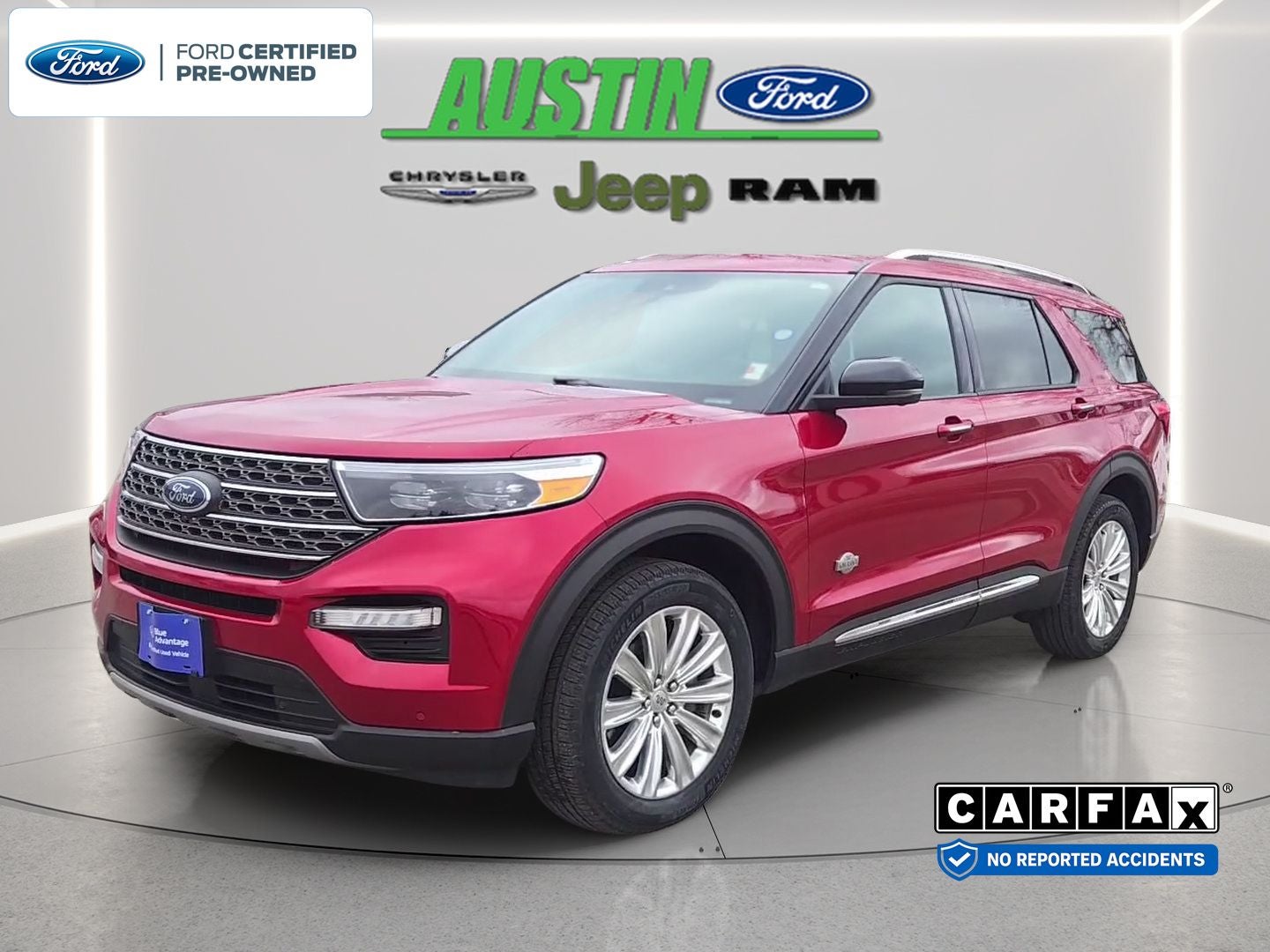2022 Ford Explorer King Ranch in Rapid Red Metallic Tinted Clearcoat — front three-quarter view