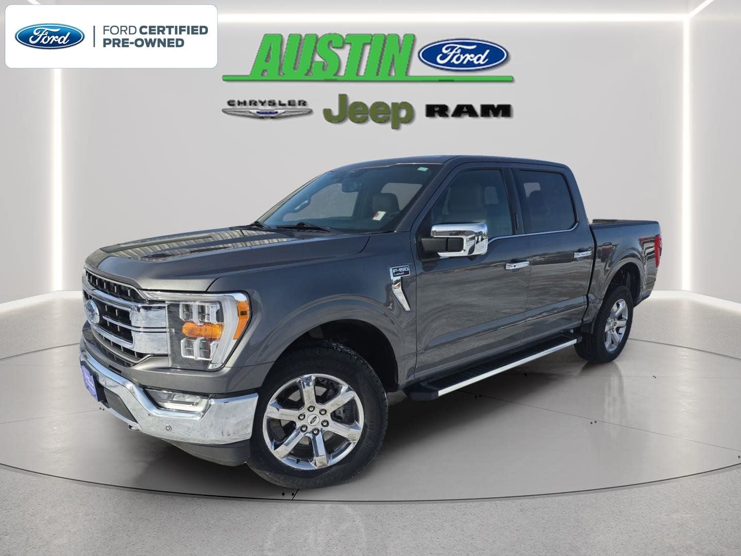 2022 Ford F-150 LARIAT in Carbonized Gray Metallic — front three-quarter view