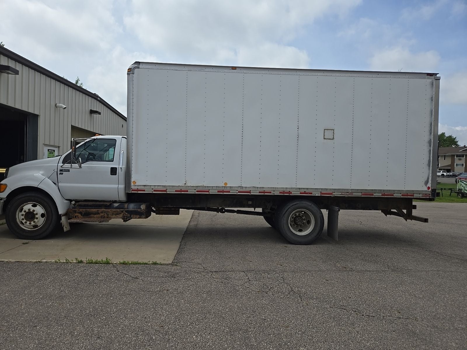 2012 Ford F-650 Gas XL in White — front three-quarter view